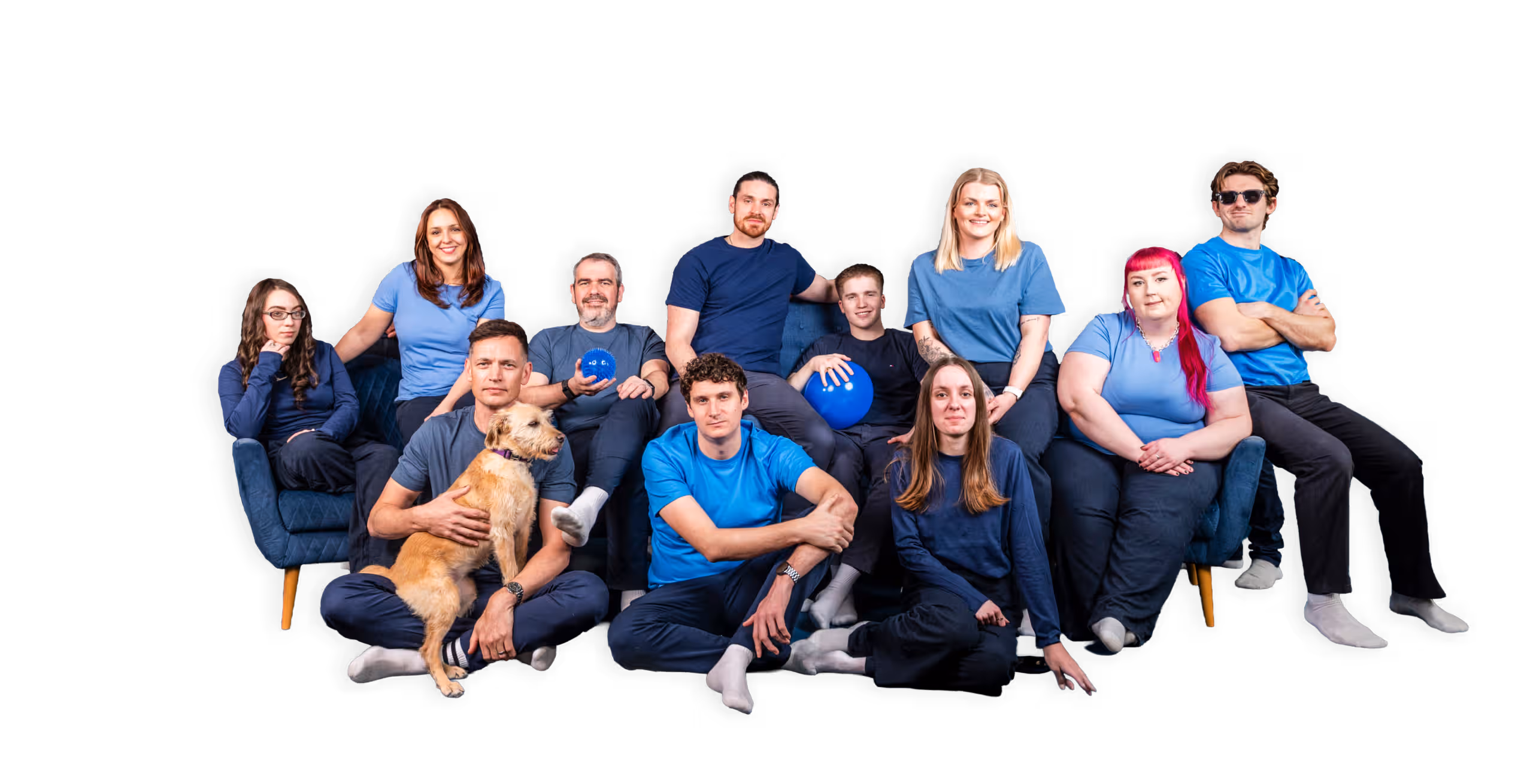 Salience search marketing team posing together in blue shirts